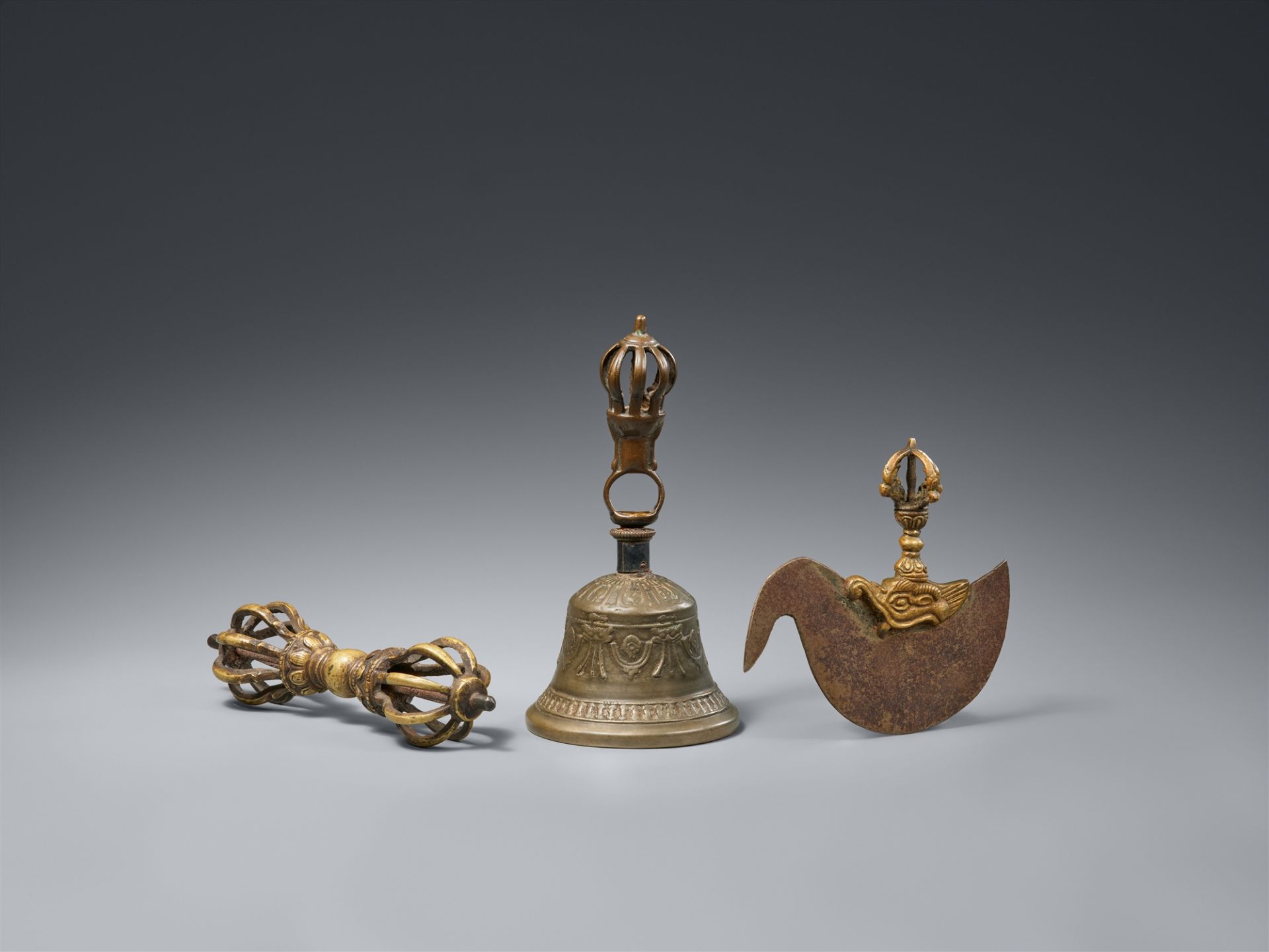 A vajra, a ghanta and an iron and brass kartika. Various metals. Tibet