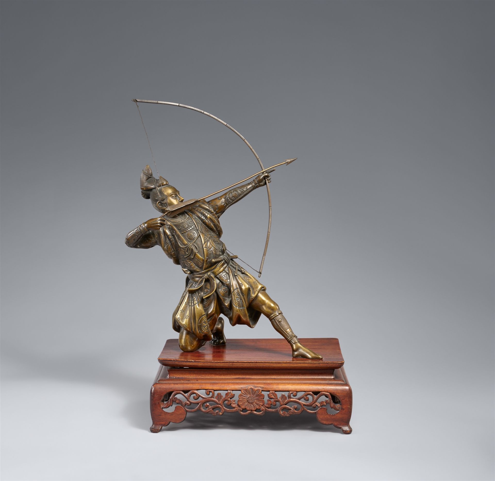 A bronze figure of a samurai archer. Around 1900