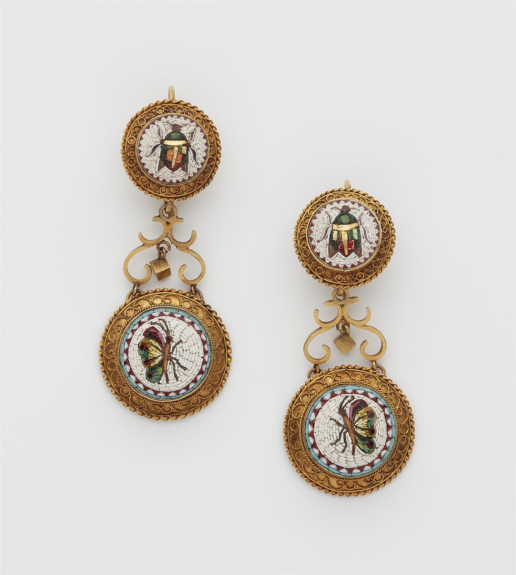 A pair of 8k gold filigree and Roman micromosaic earrings.