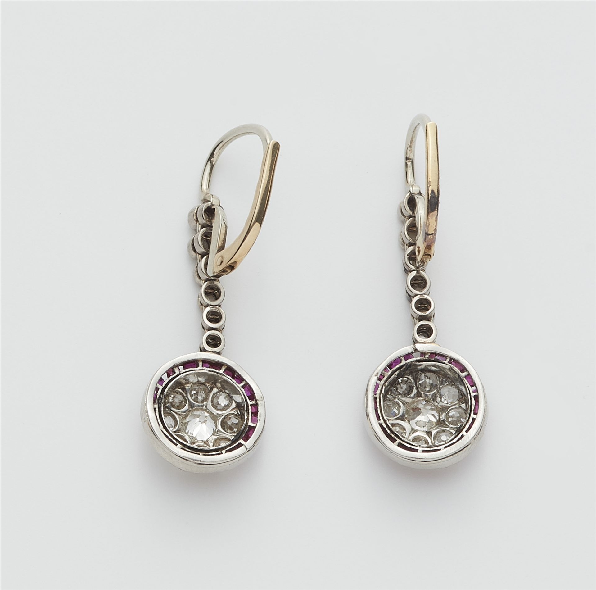 A pair of platinum 14k gold diamond and ruby Belle Epoque earrings. - Image 2 of 2