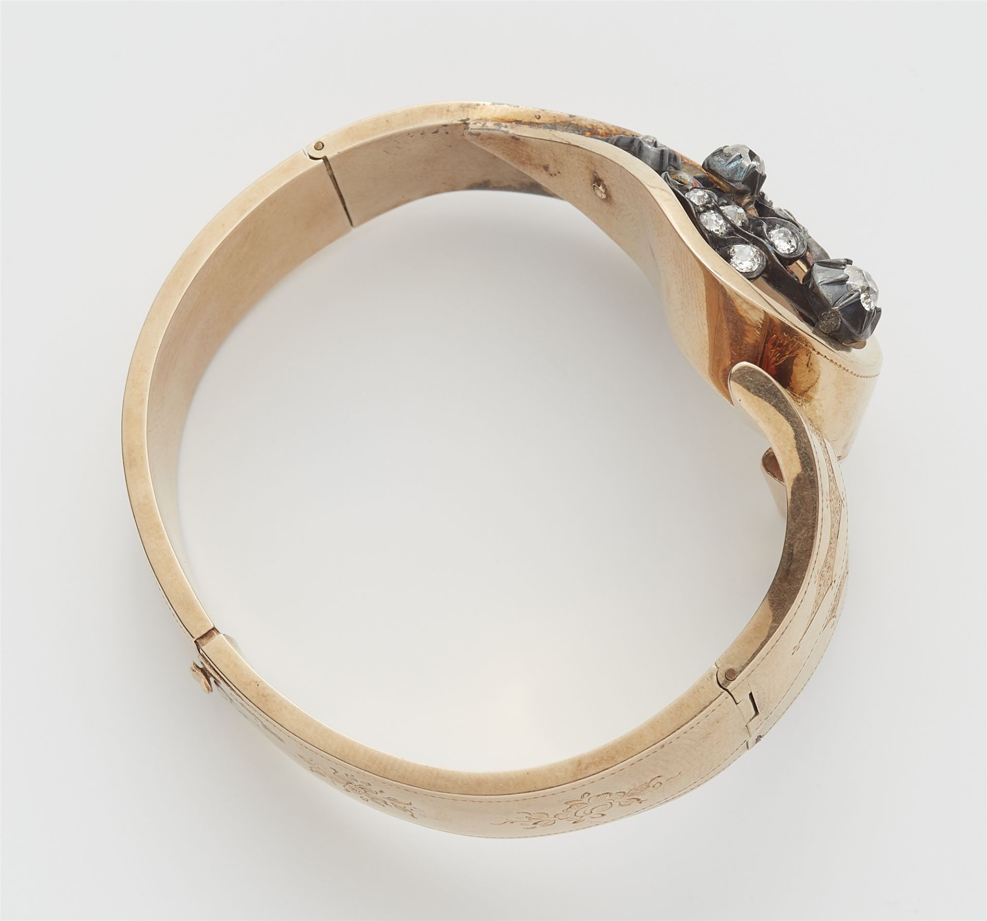 A 14k red gold silver and diamond bangle. - Image 2 of 3