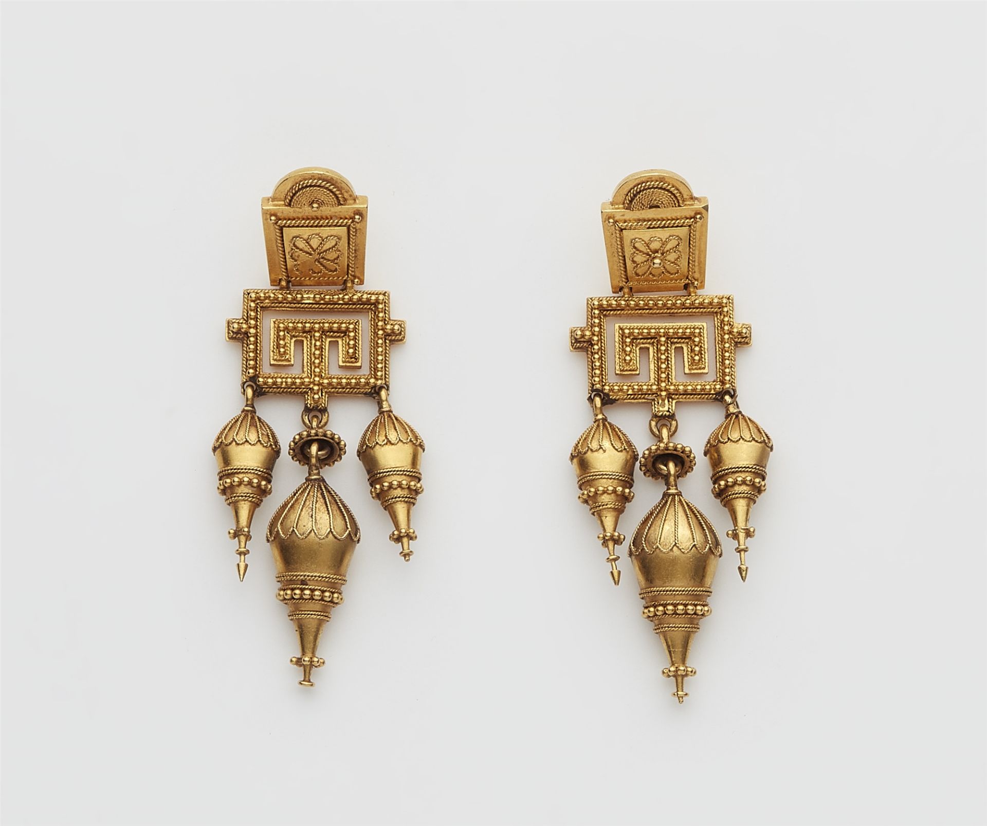 A pair of 18k gold filigree Etruscan Revival dangling earrings.