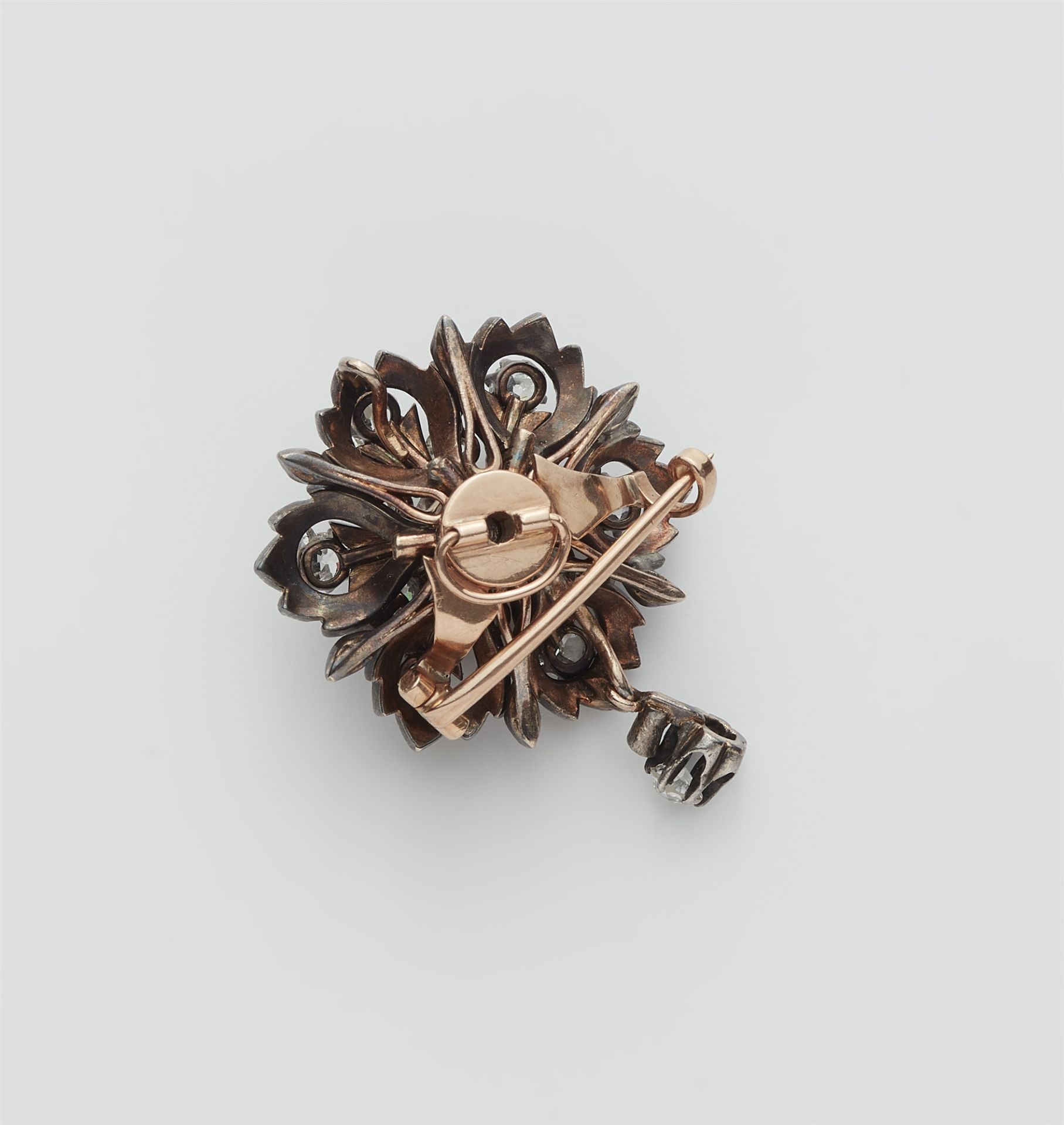 A silver 14k red gold diamond rosette brooch. - Image 2 of 2
