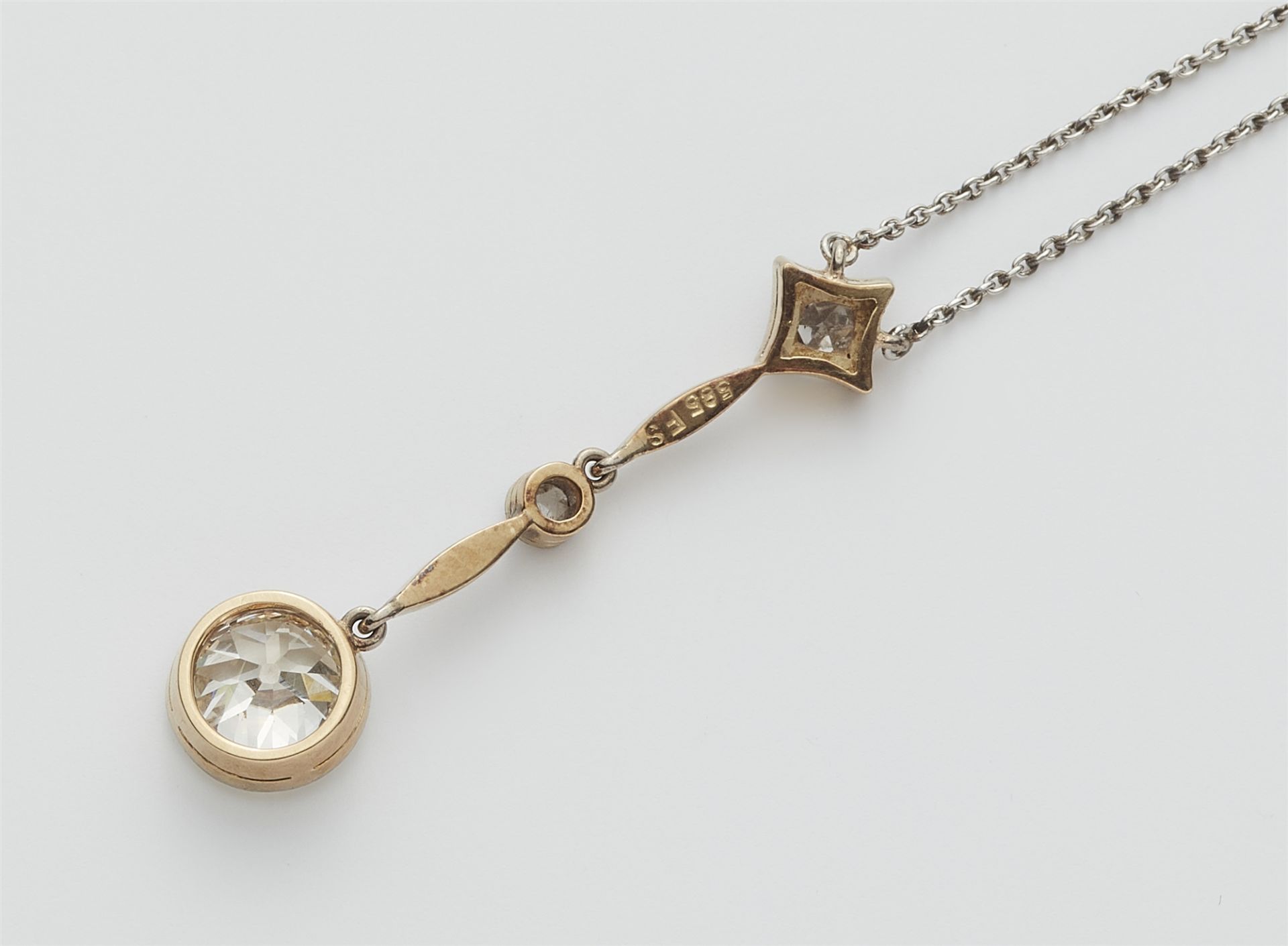 A Belle Epoque 14 kt gold platinum and European old-cut diamond solitaire pendant necklace. - Image 3 of 3