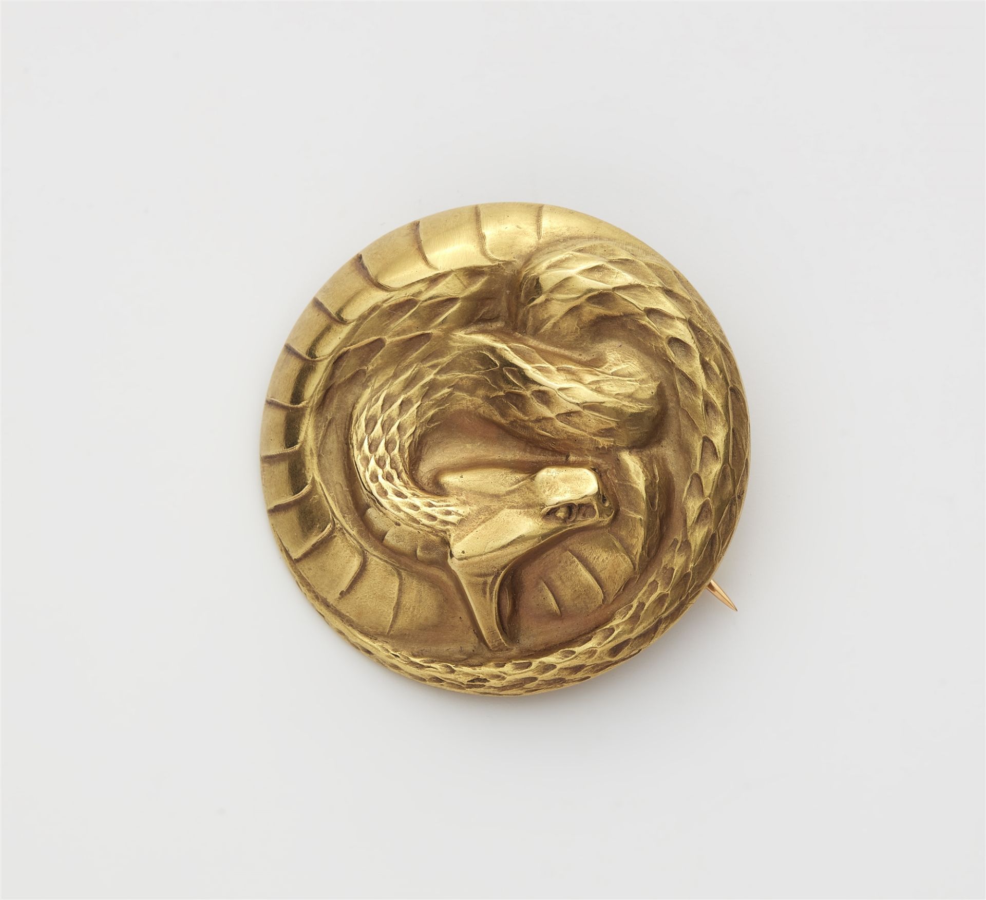 A French Art Nouveau 18k gold snake hat pin with Wartski leather case.