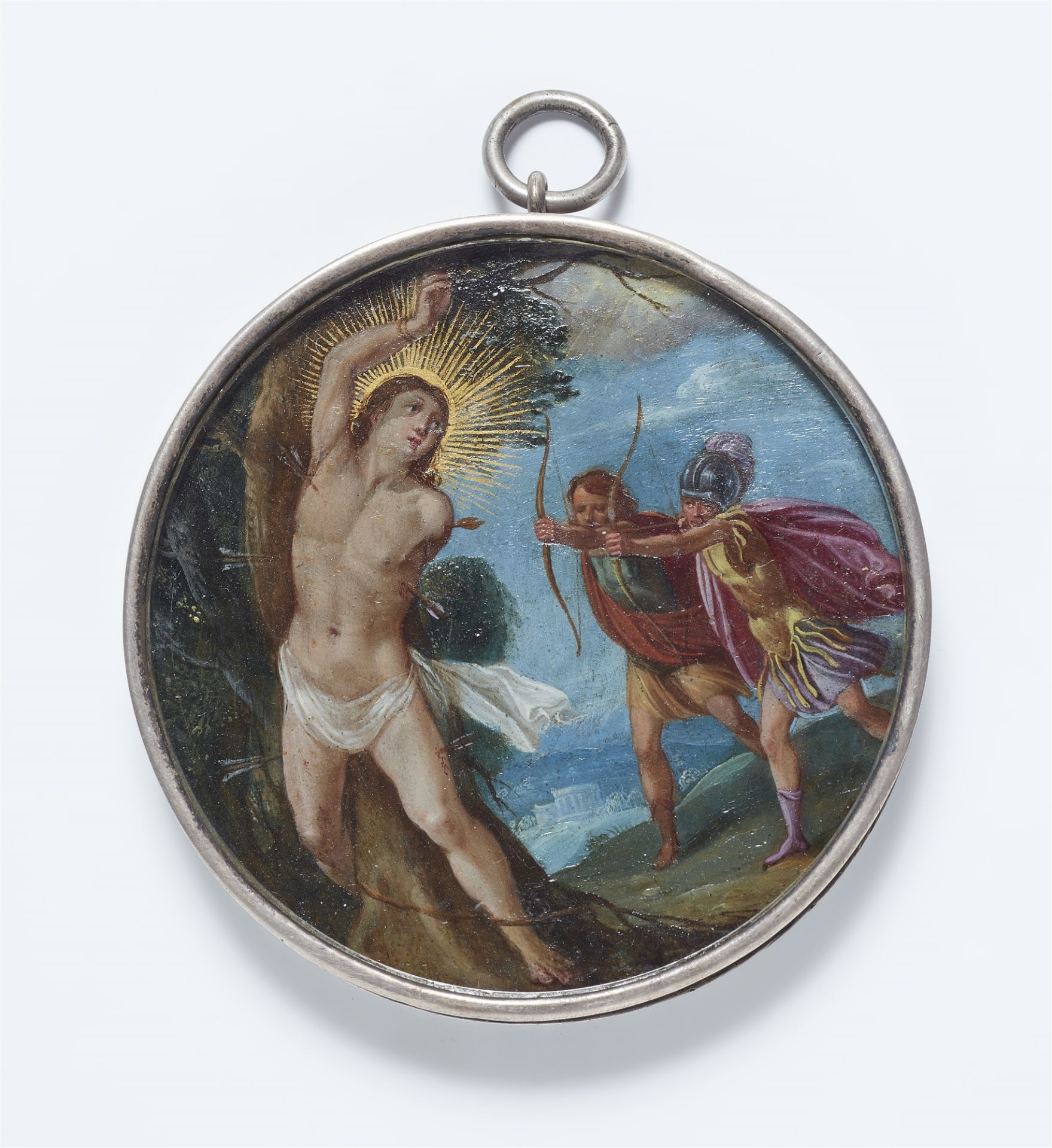 A capsule depicting the martyrdom of St. Sebastian