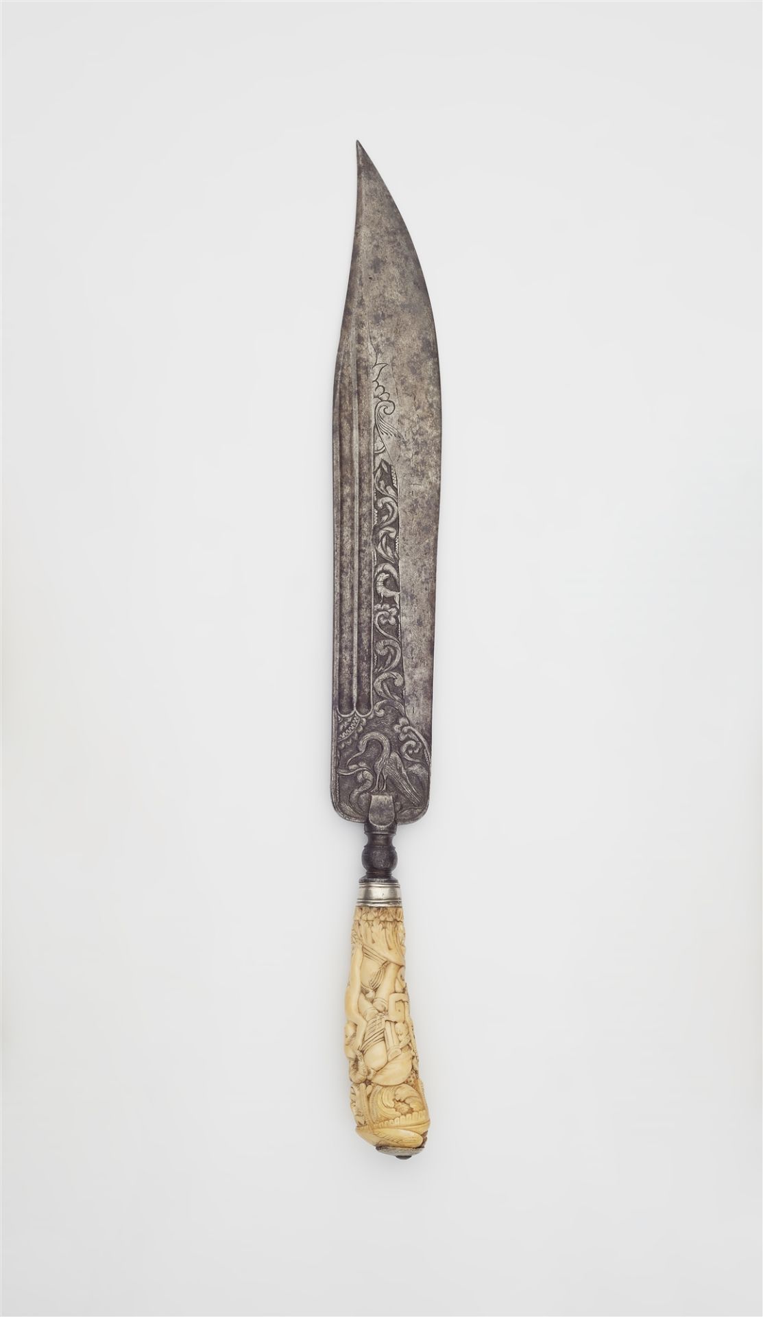 A Colonial hunting knife with a figural ivory handle