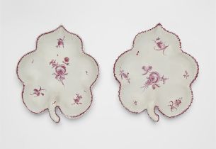 A pair of Proskau faience leaf rimmed dishes with rose motifs