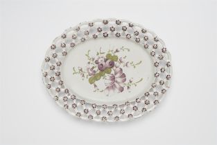 An oval Magdeburg faience platter with pierced rim