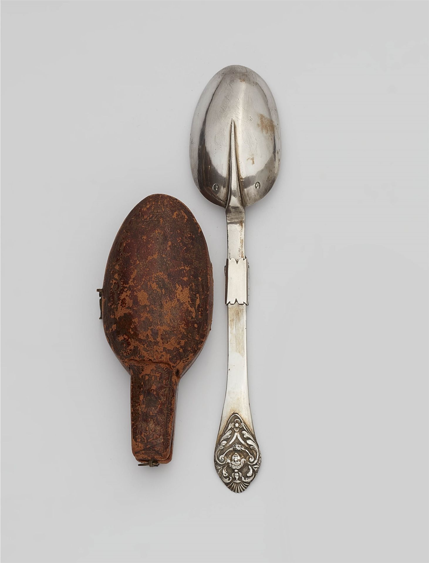 An Augsburg silver folding spoon in a case