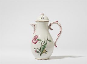 A Proskau faience jug with carnation decor