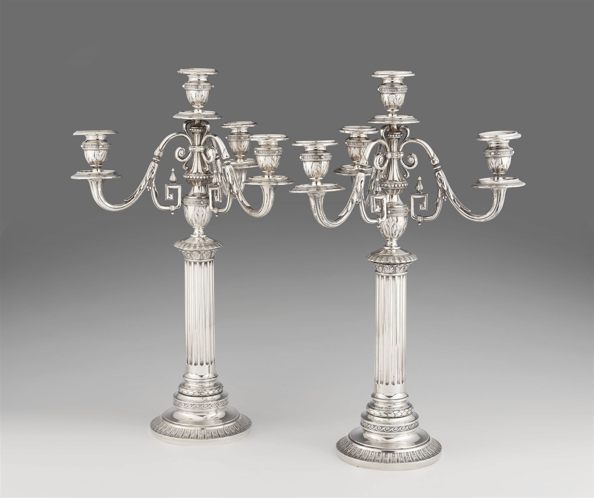 A pair of Strasbourg silver candelabra