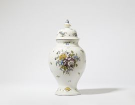 A faience vase with floral decor