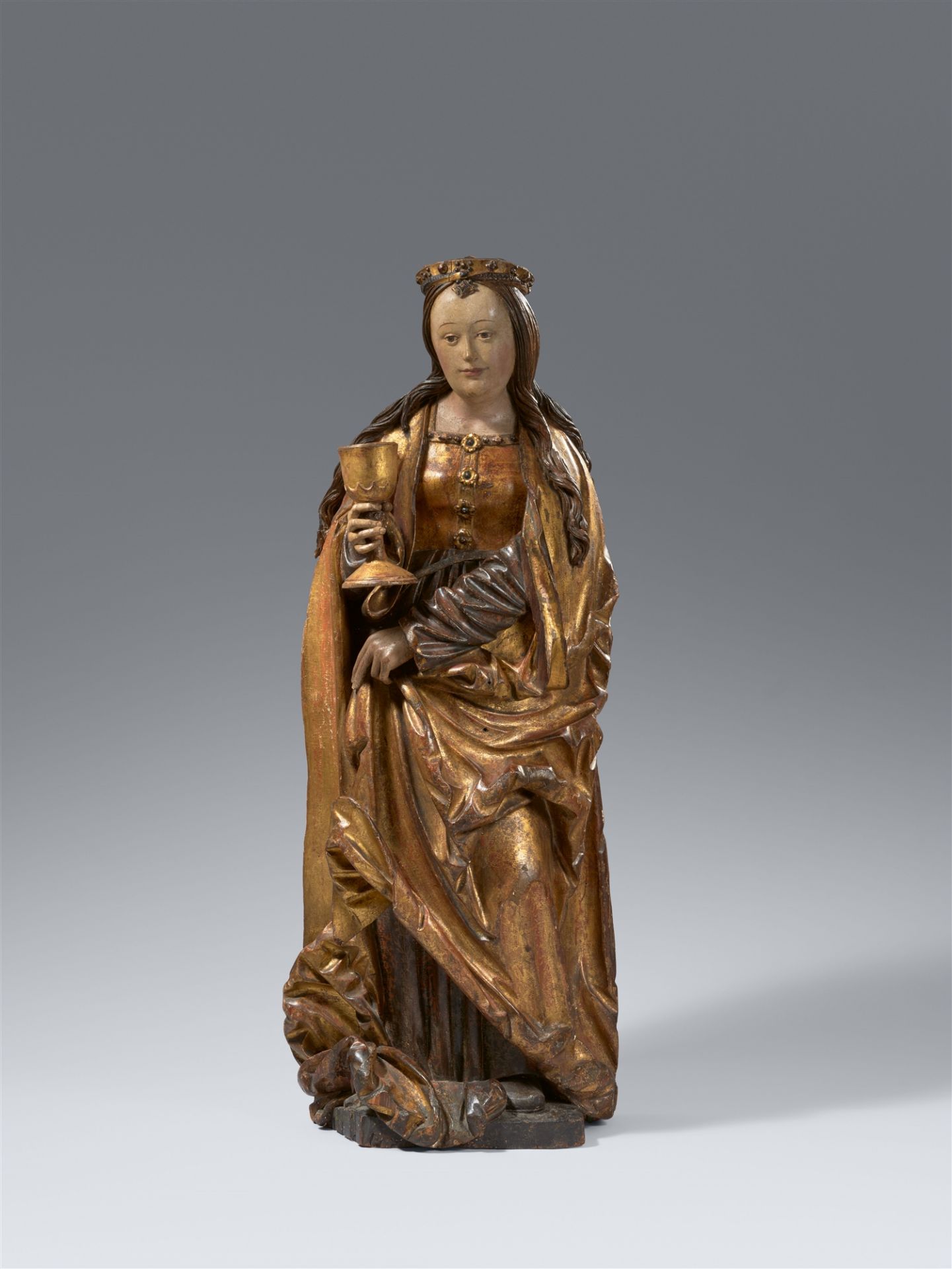 A carved wood figure of St Barbara, circle of Jörg Lederer