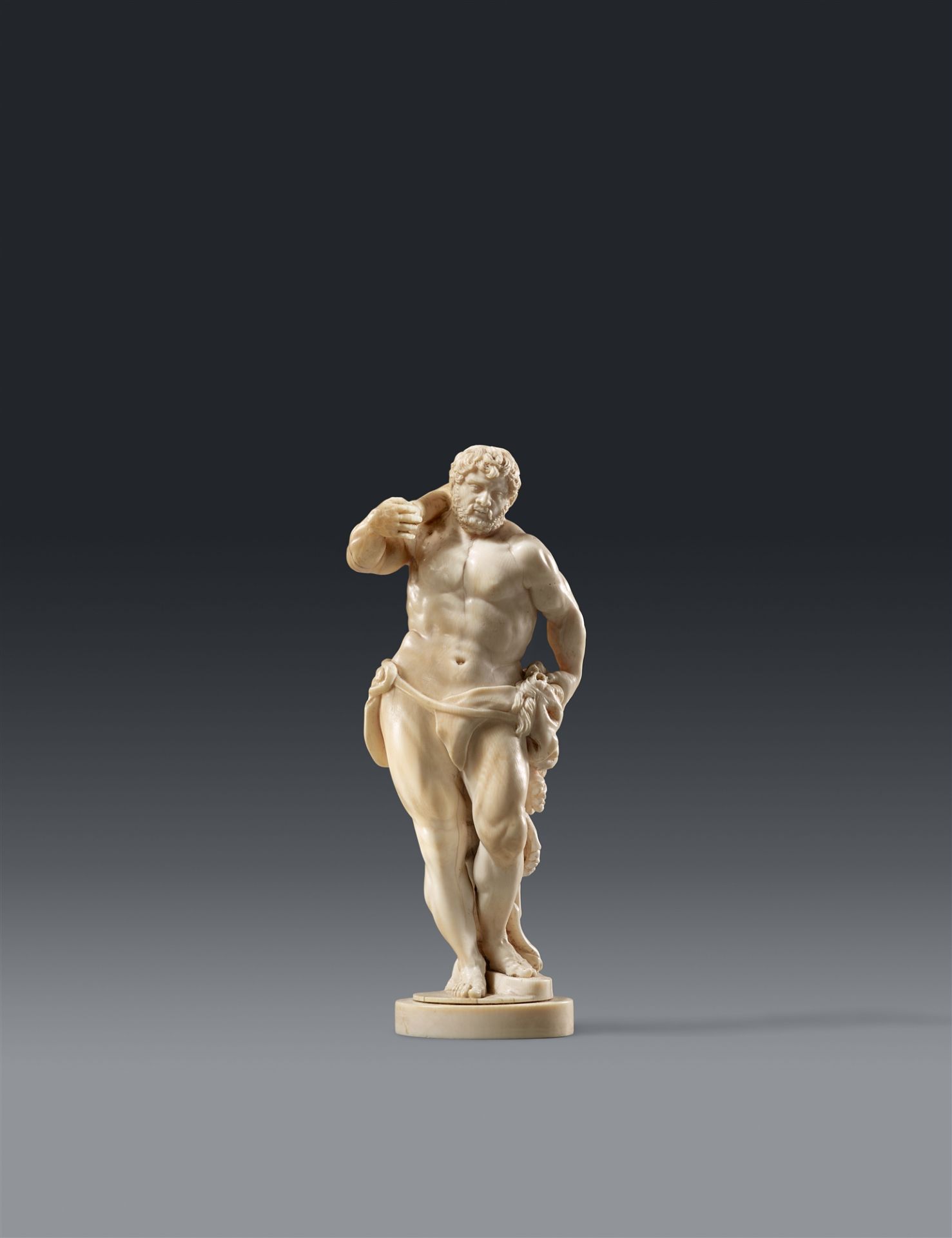 A carved ivory figure of Hercules, attributed to Francis van Bossuit
