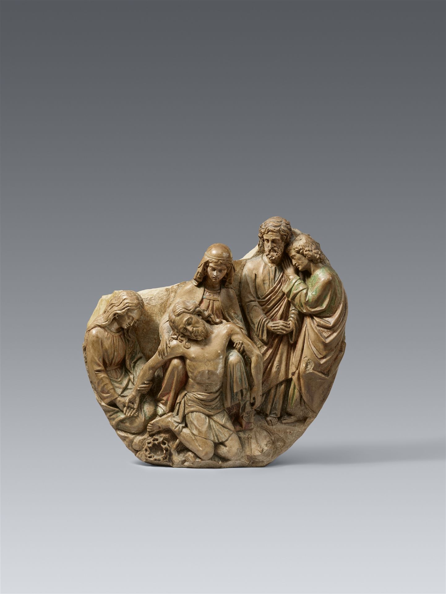 A Northern French limestone relief of the Lamentation of Christ, circa 1600