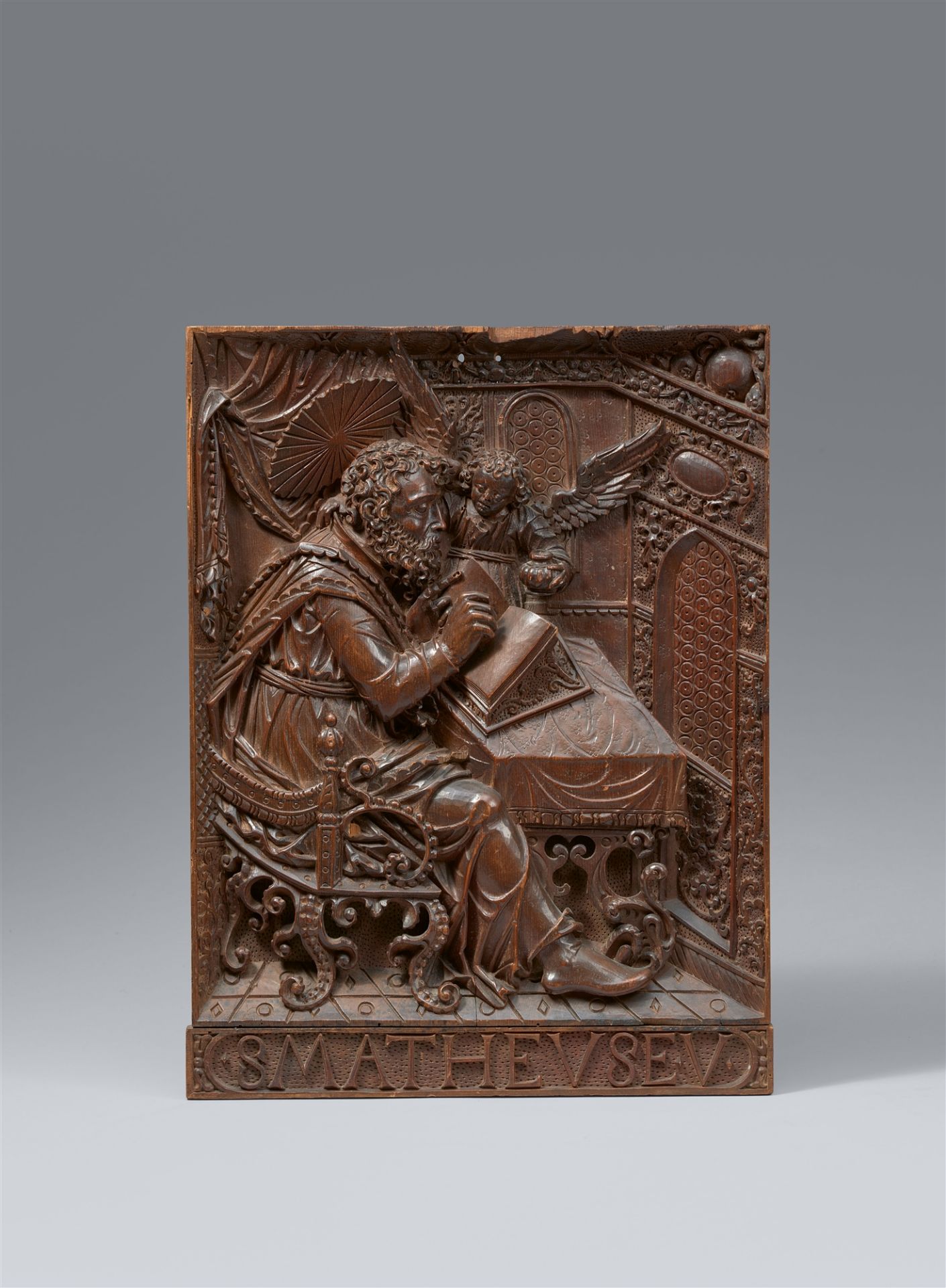 A carved wood relief of St Matthew, Bavaria, 1st quarter 17th century - Image 2 of 2