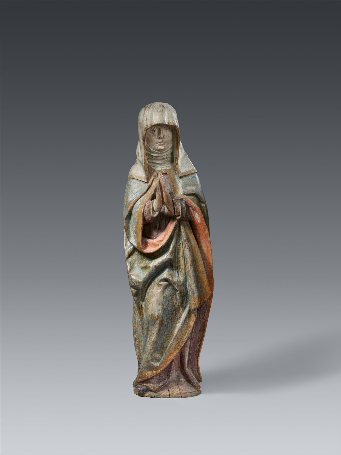 A carved wood figure of the mourning Virgin, presumably Bavaria, early 16th century