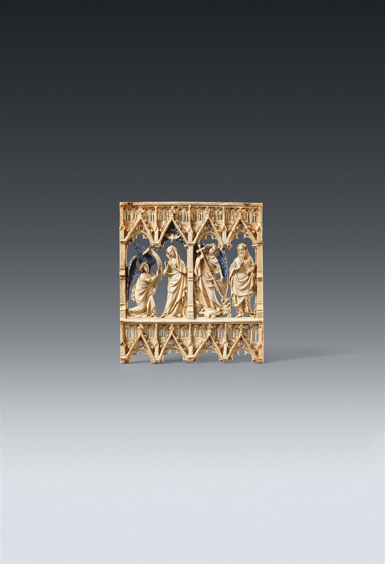 A 14th century Parisian carved ivory relief
