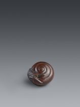 A wood netsuke of a snail. Early 19th century