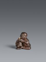 A Miwa-style wood netsuke of a chajin. First half 19th century