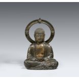 A large bronze figure of Buddha Amida Nyorai with halo. Bronze. Dated 1854