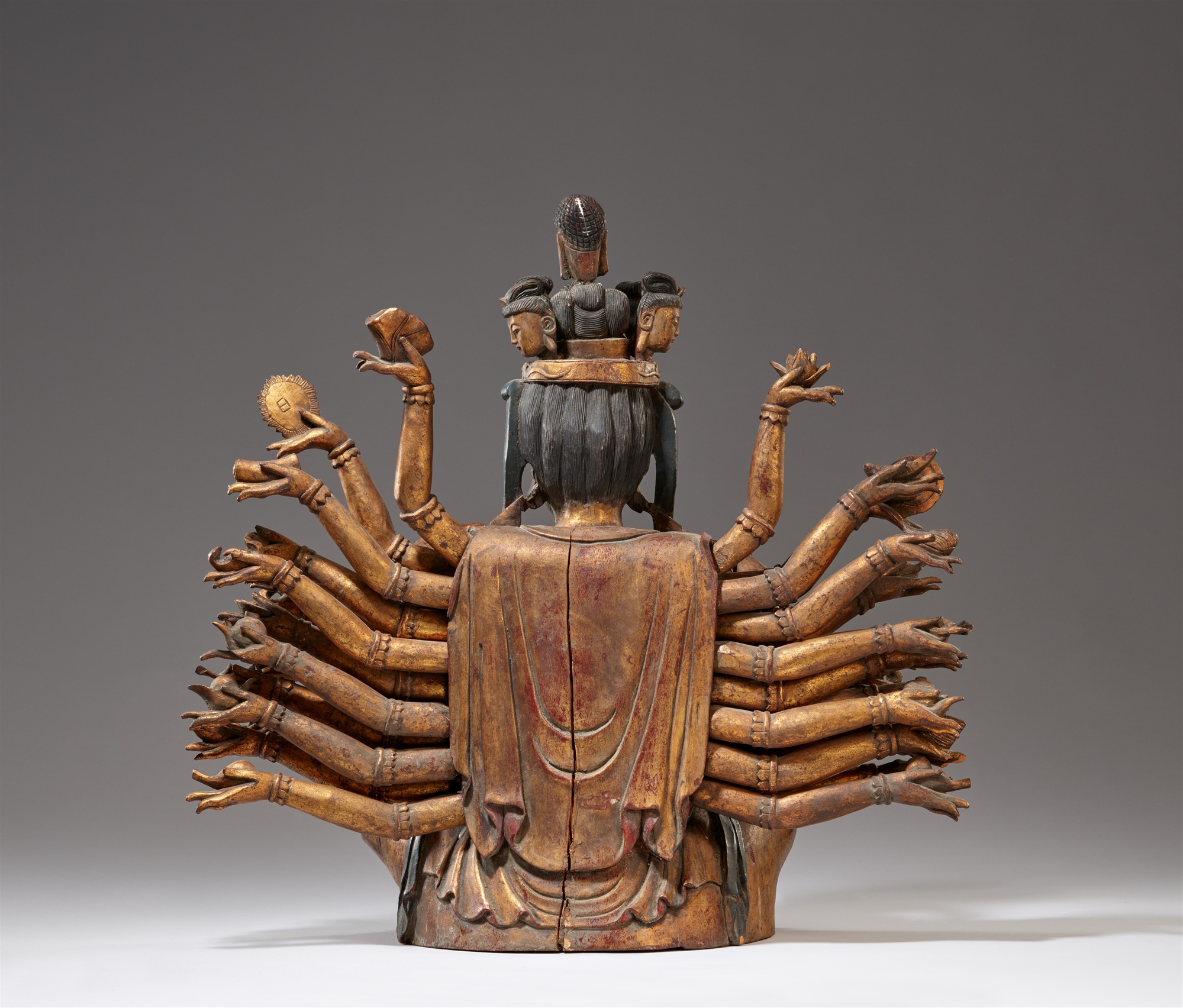 A lacquered wood figure of a Thousand Arm Guanyin. Qing dynasty, 19th century - Image 2 of 2
