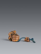 A boxwood netsuke of Shōki and oni. Second half 19th century