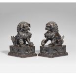 A pair of bronze lion-dogs. Late 19th century