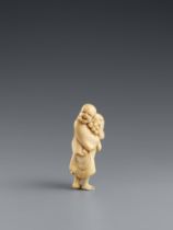 An ivory netsuke of a laughing peasant. Early 19th century