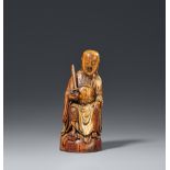Figur eines sitzenden Zhenwu. Elfenbein. Ming-Zeit, 16./17. Jh.