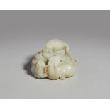 A light grey jade paper weight. Qing dynasty