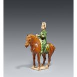Sancai-Figur eines Pferds mit Reiter. Tang-Zeit (618-907)
