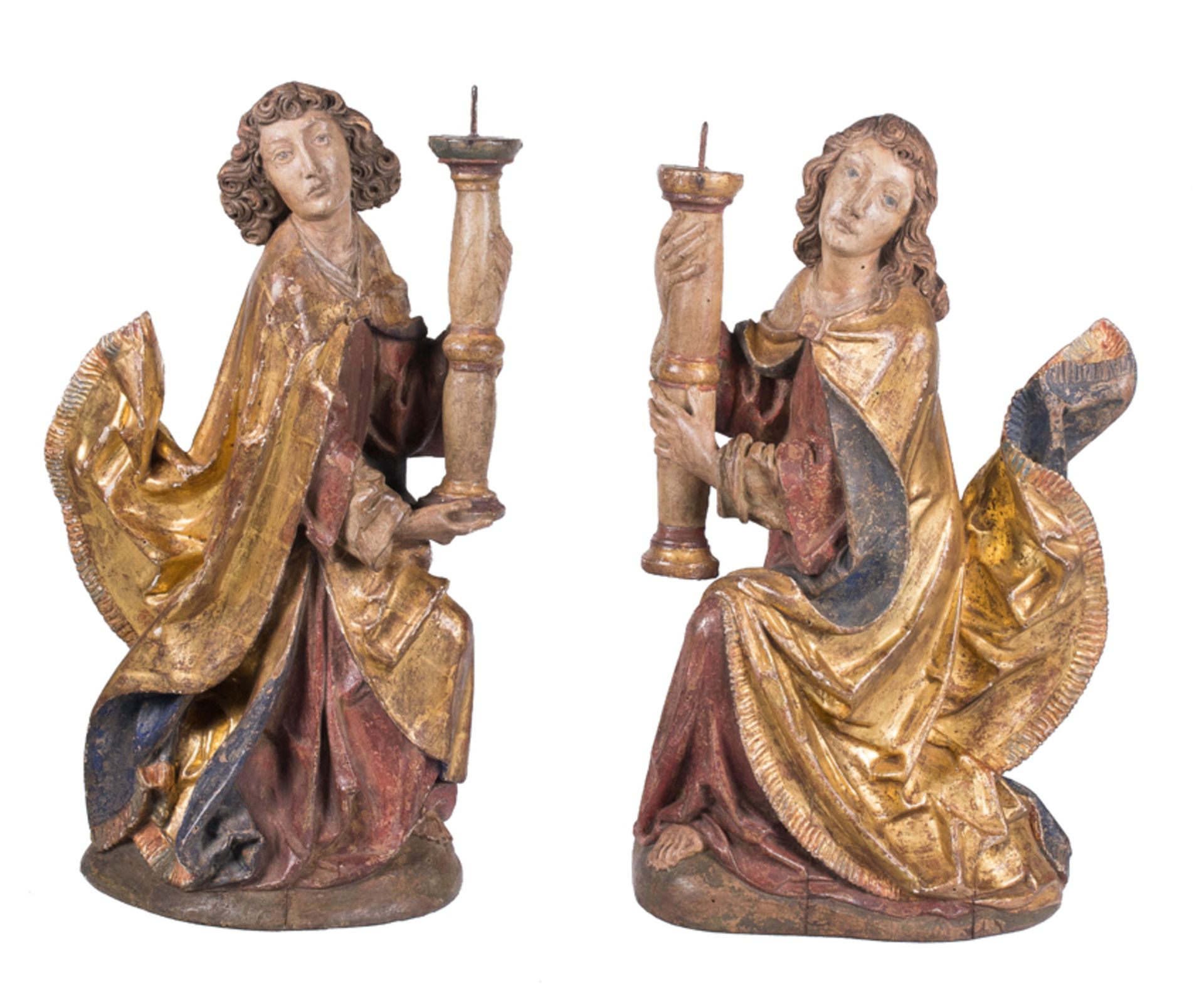 Pair of carved, polychromed and gilded wooden torch-bearing angels. Germany or Austria. 15th century