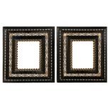 Pair of imposing carved, ebonised wooden frames with applications of bone and stained bone. Venice.