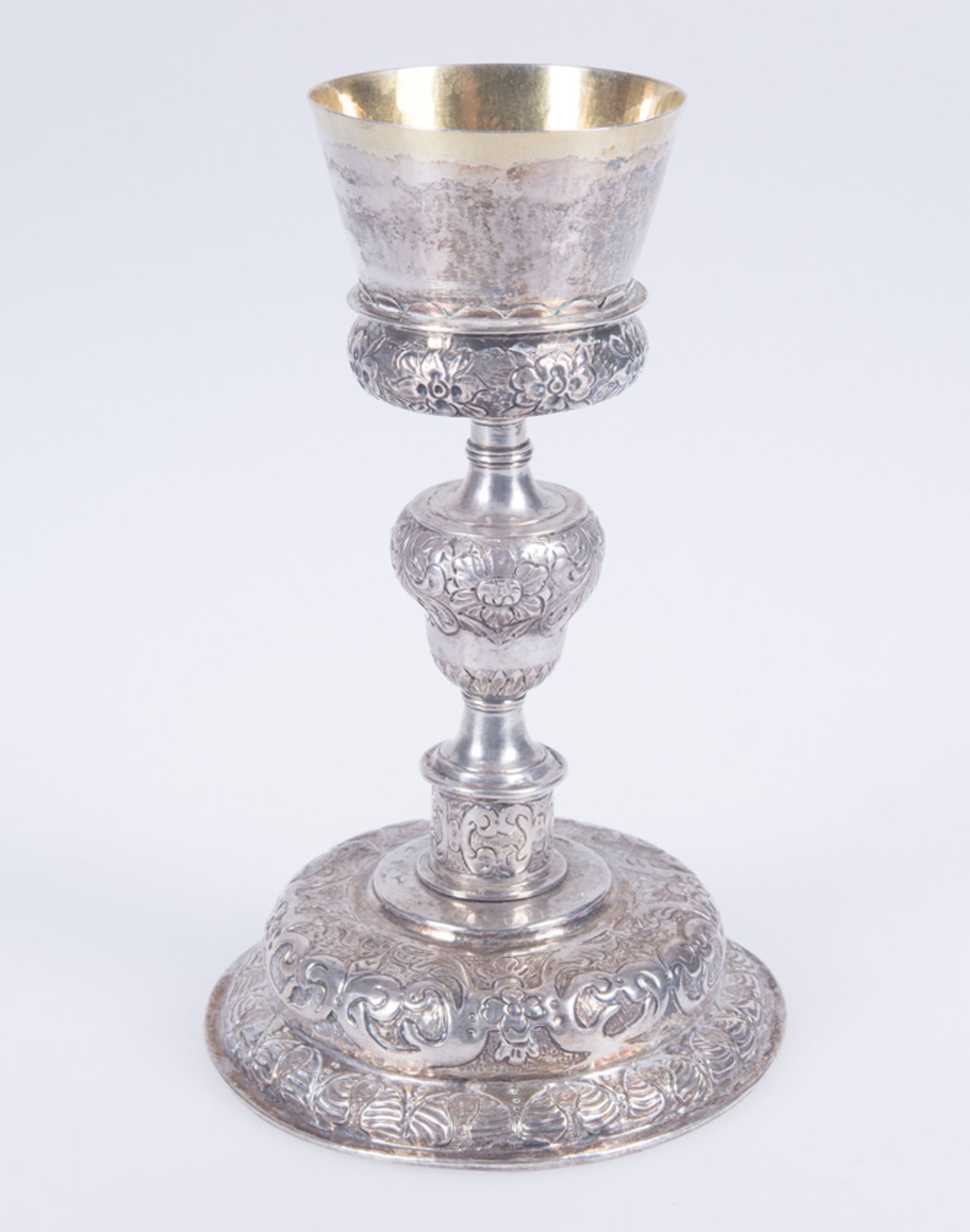 Embossed and chased silver chalice with a silver vermeil interior. Possibly Mexican. Late 16th cent - Image 2 of 8