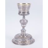 Embossed and chased silver chalice with a silver vermeil interior. Possibly Mexican. Late 16th cent
