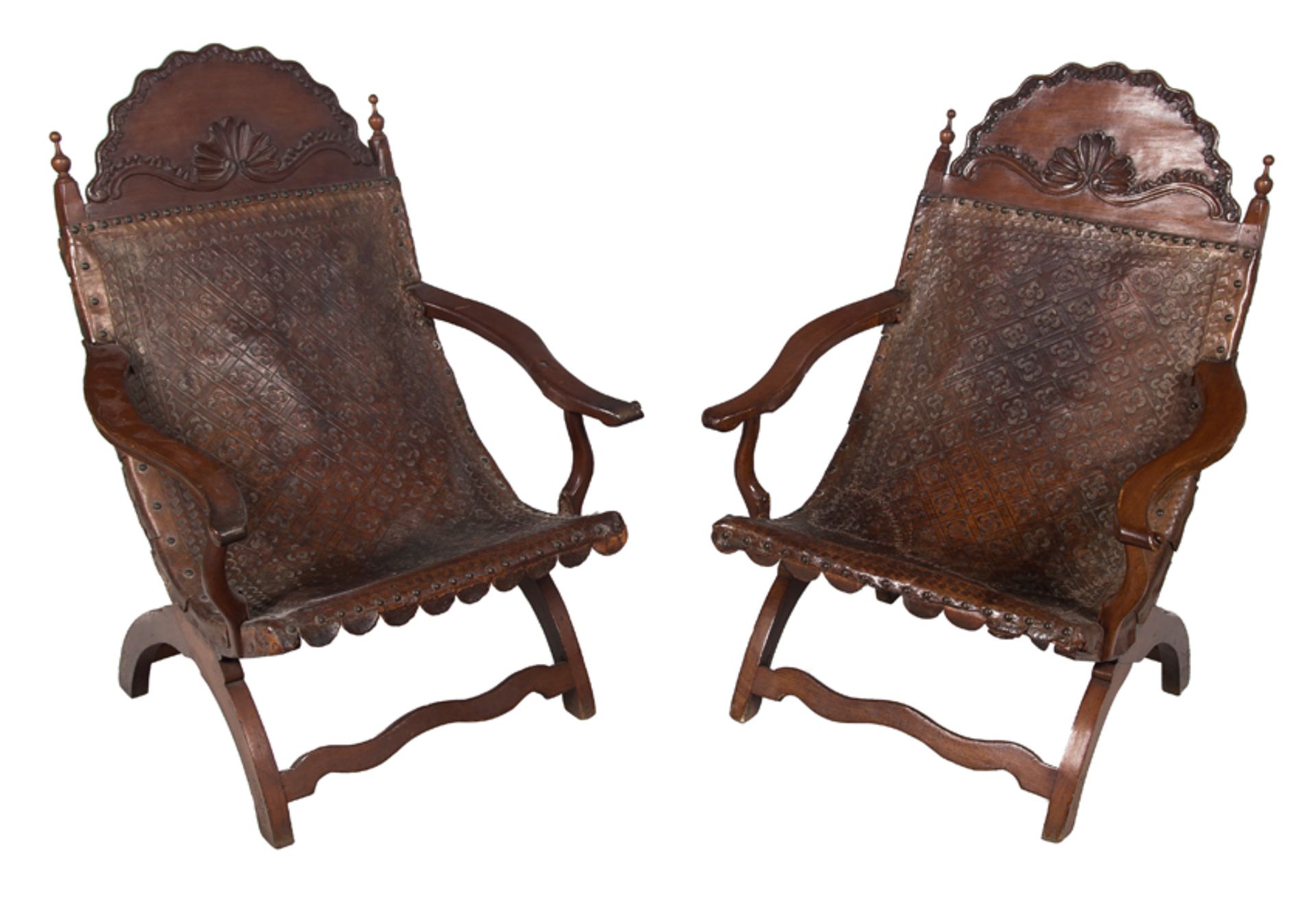 Pair of "Campeche" chairs. Made of cedar wood and leather. Mexico. Late 18th century.