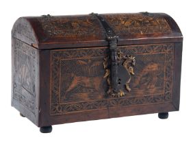 Engraved wooden chest with iron fittings and curved lid. Colonial work. Villa Alta de San Ildefonso,