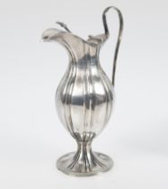 Silver pitcher. 19th century