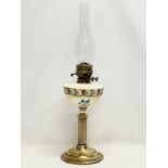A Victorian double burner oil lamp. 65cm