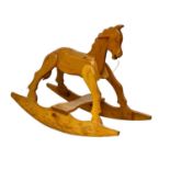 A child’s pine rocking horse. 95x74cm