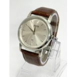 A gents Hugo Boss watch with a Citizen leather strap.