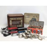 A sundry lot. Including a vintage Prilect Traveling Iron, vintage tins, quantity of silver plated