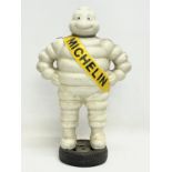 A large cast iron Michelin Man advertising figure. 39.5cm