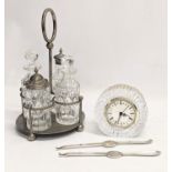 A sundry lot. Including a Tyrone Crystal mantle clock, a vintage cruet set and a pair of silver