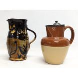 2 vintage stoneware jugs. Tallest measures 18cm
