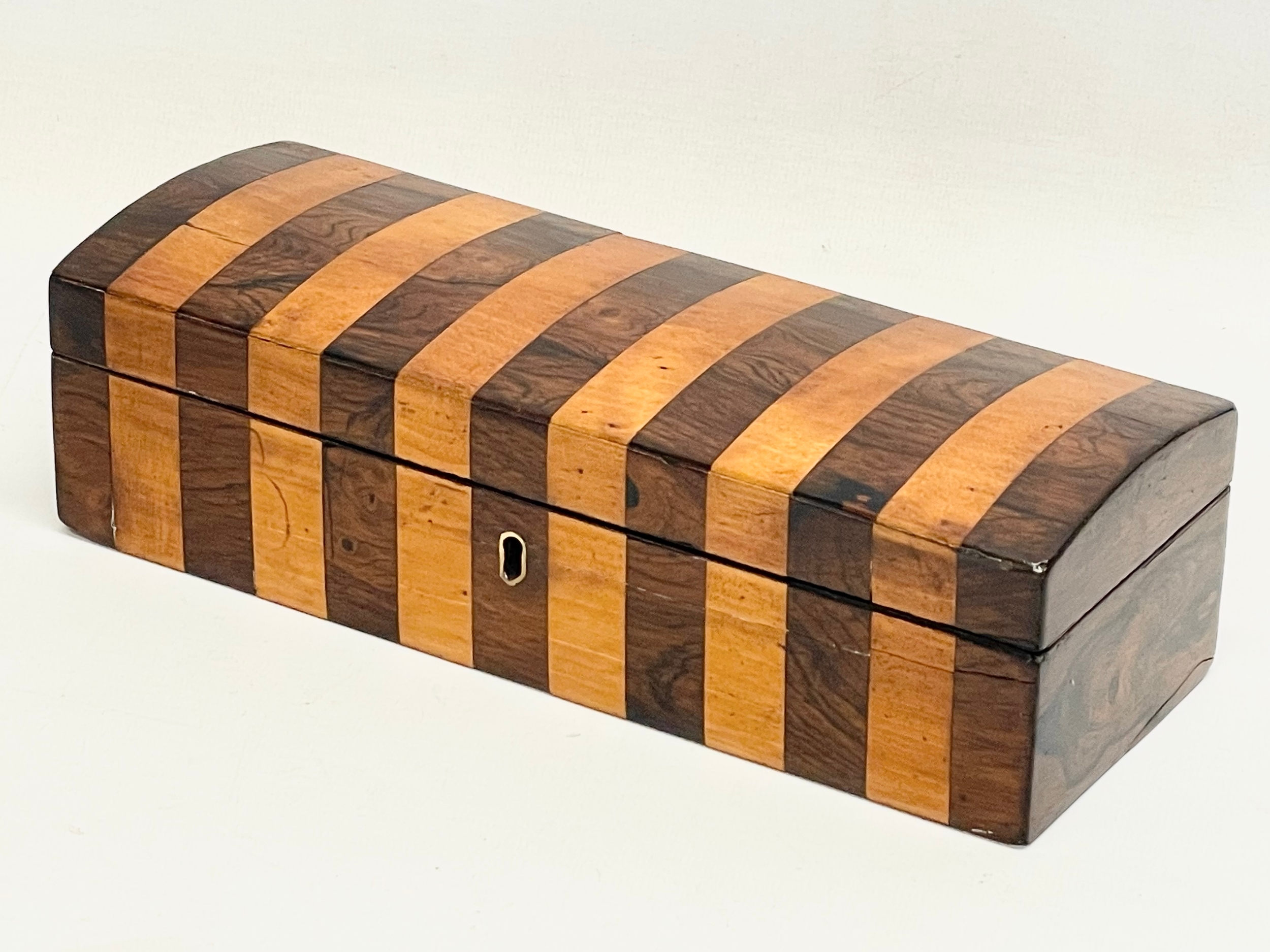 A Victorian Rosewood and Satin Wood box. 24x9x6.5cm