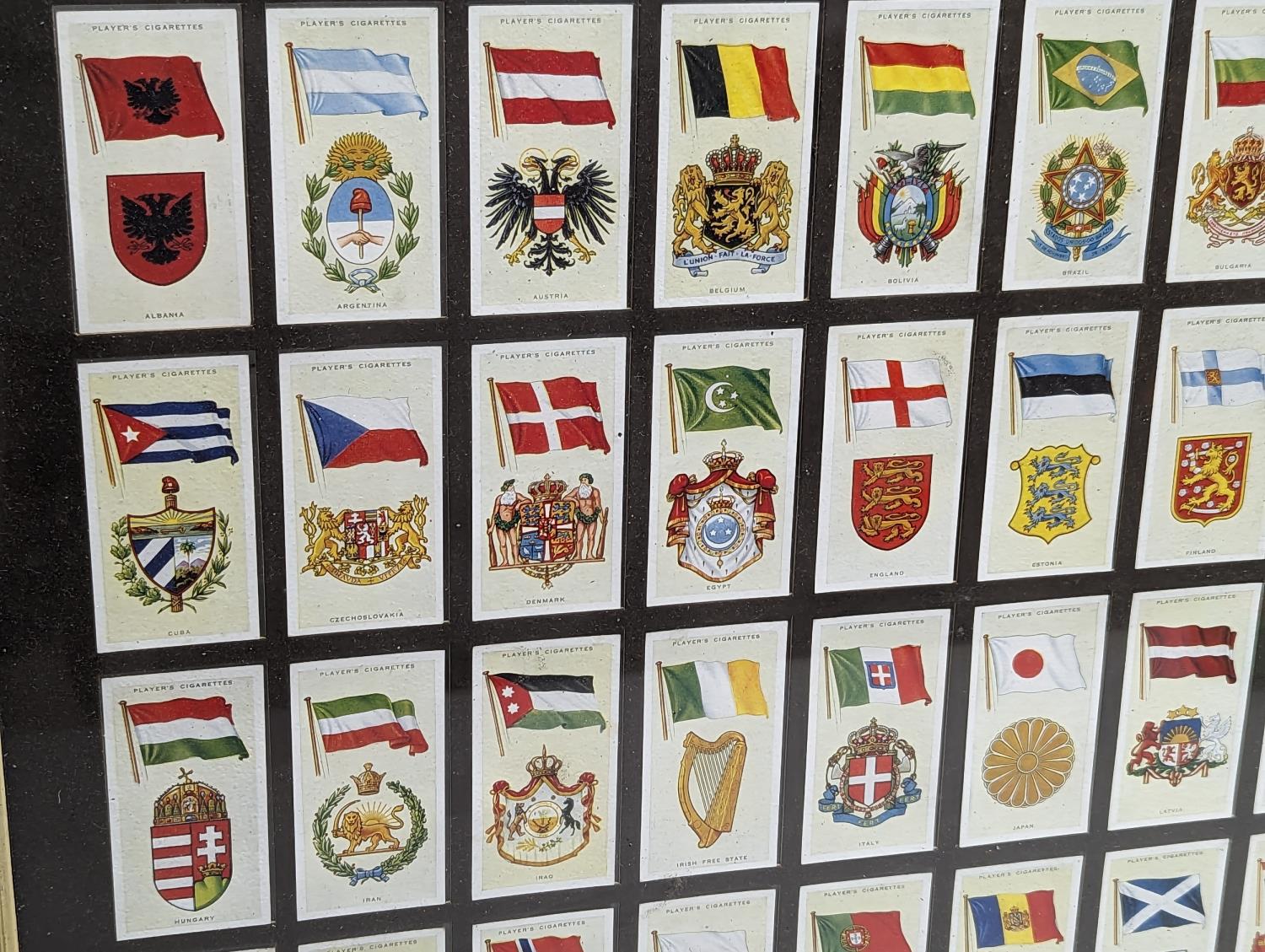 A framed collection of vintage John Players & Sons cigarette cards, National Flags and Arms. 51. - Image 3 of 5