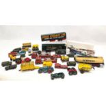 A collection of Corgi and other model cars, trucks, etc.